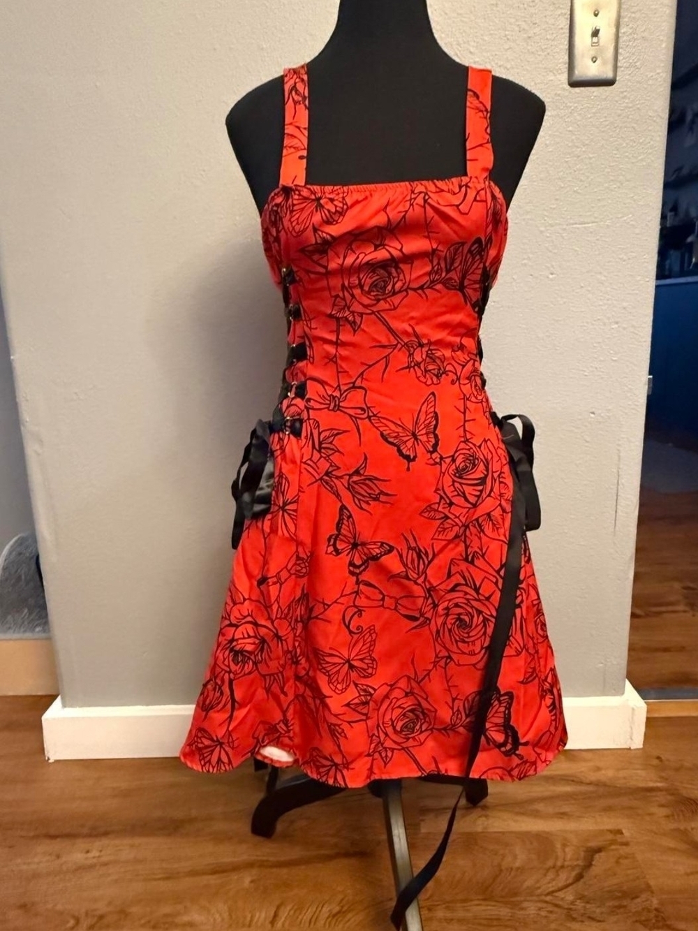 Red Floral Lace-Up Mini Dress with Black Accents